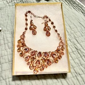 Rose gold bib style necklace and matching earring set brand new with box